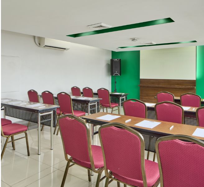 room with wood table and black chair
