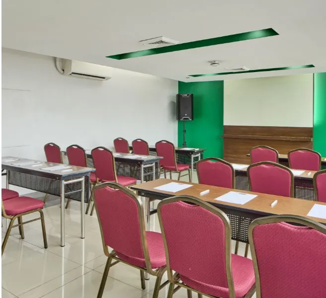 room with wood table and black chair